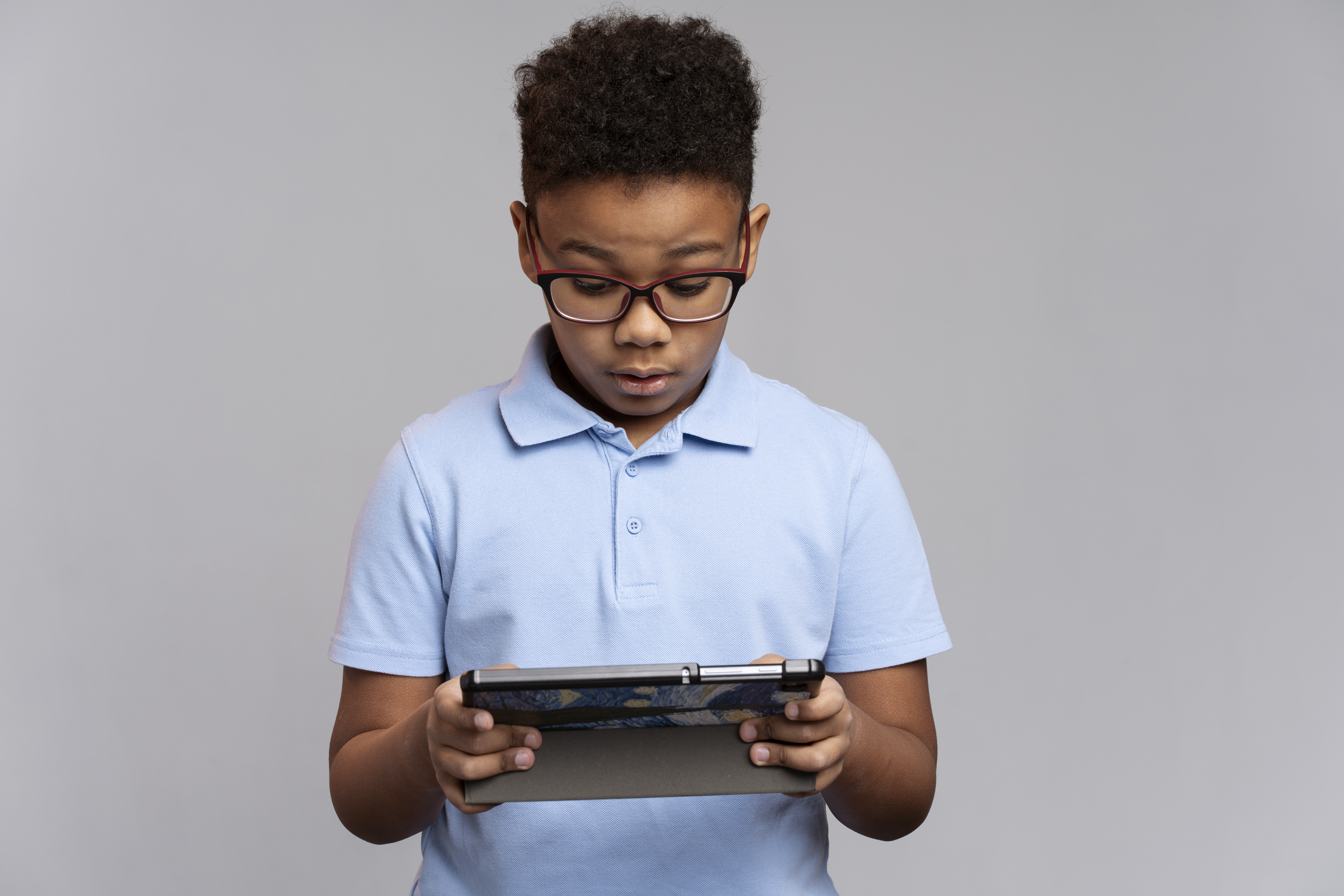 Child focused while learning on a mobile device